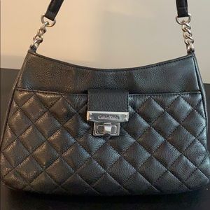 Black quilted Calvin Klein purse, silver hardware